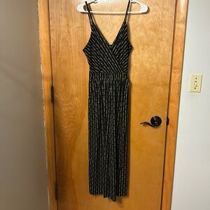 Black and cream jumpsuit with tie side. Kaileigh brand size small